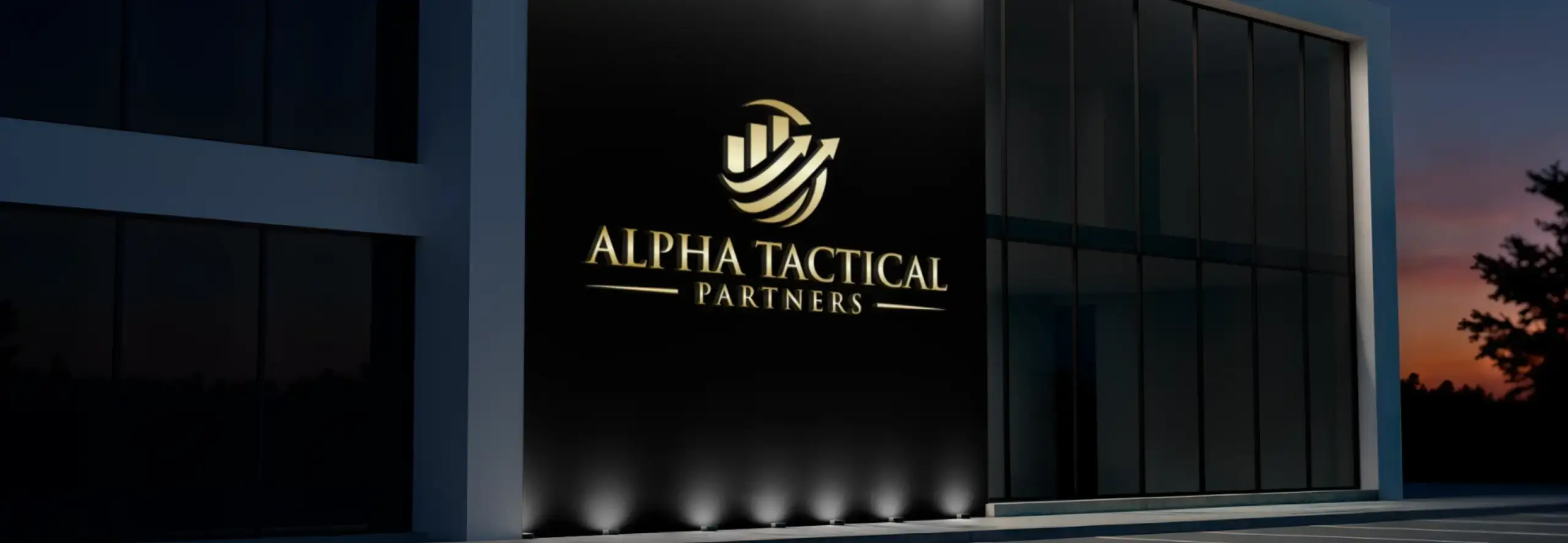 Gold Alpha Tactical Partners logo mounted on a black exterior wall